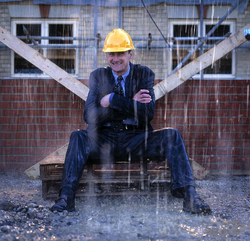 Builder in the rain 